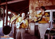 Image Dated 1986.  Entertainment (possibly in-front of Country Bear Jamboree attraction).