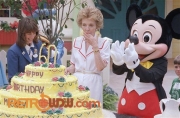 Nancy and Mickey celebrate in Mickey's Birthdayland
