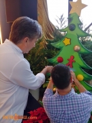 Todd signing the tree