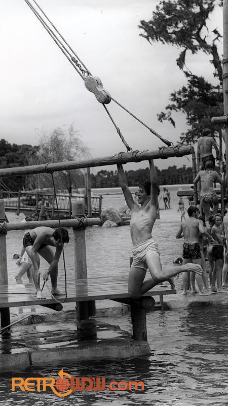 A swimmer enjoys a refreshing experience on the Boom Swing